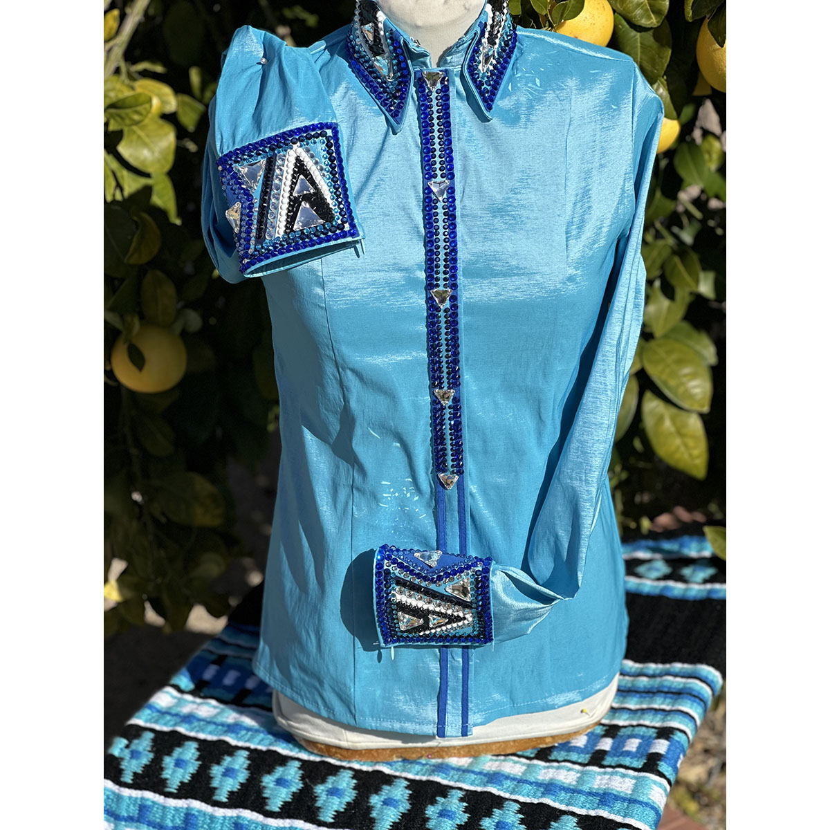 Sky Blue Western Show Shirt on a matching saddle blanket